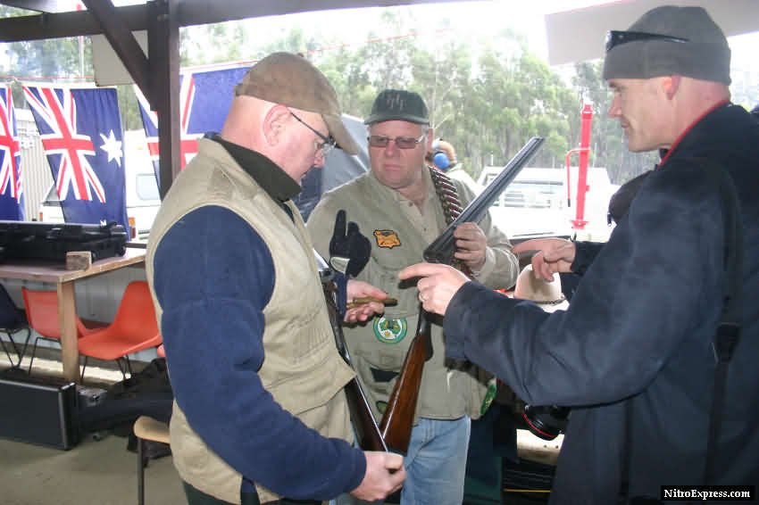Graeme Wright and Andrew Hepner, explaining their rifles to the photographer.